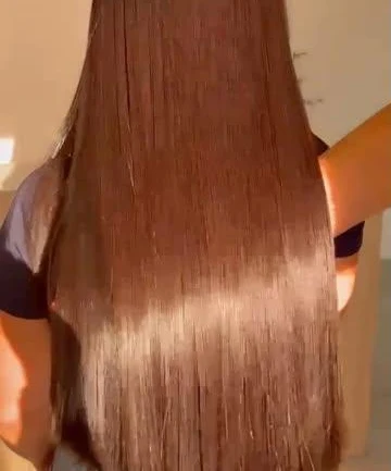 Cabelo castanho liso e brilhante